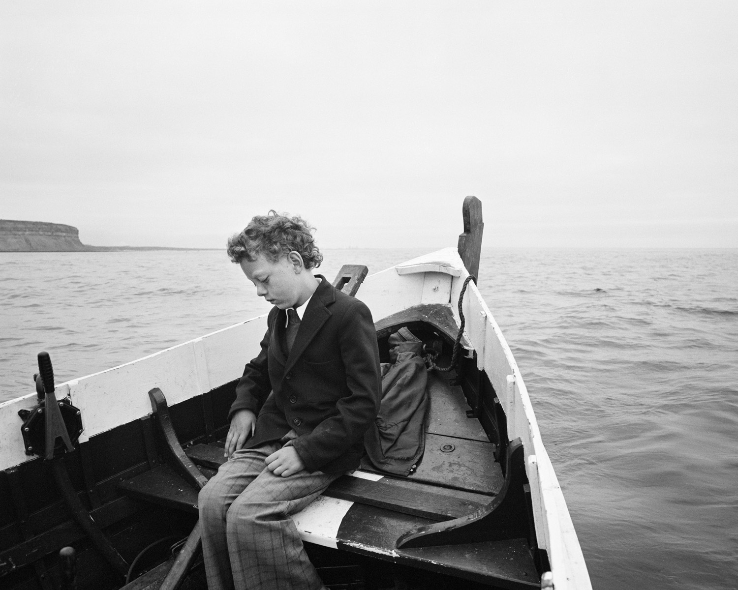 Simon being taken to sea for the first time since his father drowned Skinningrove North Yorkshire 1983